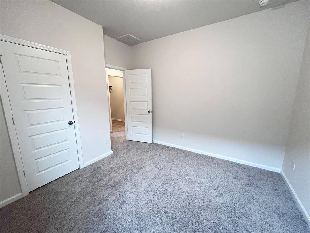 The Cardinal II- Secondary Bedroom. Home under construction. Sample floor plan photo used for illustrative purposes only. Upgrades, selections options, windows and colors may vary.