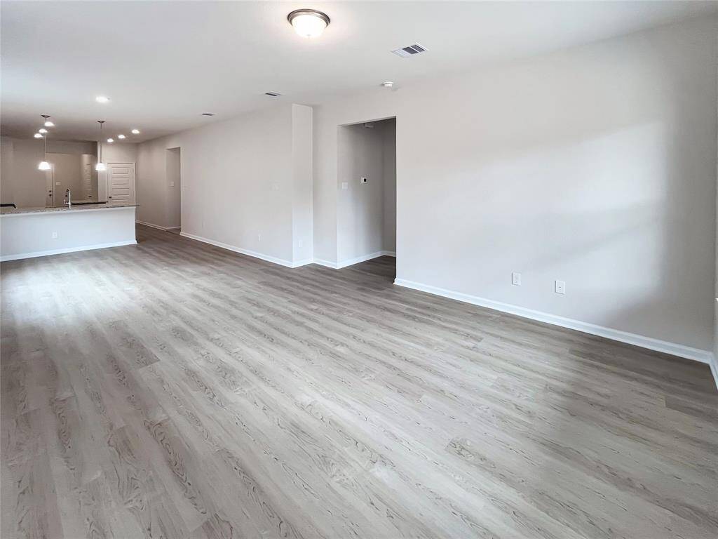 The Cardinal II- Family Room. Home under construction. Sample floor plan photo used for illustrative purposes only. Upgrades, selections options, windows and colors may vary.