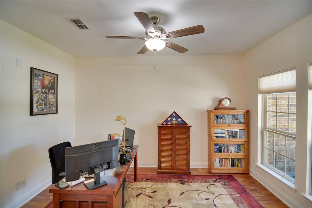 Versatile bonus room that can be used as a home office, gameroom room, or playroom.