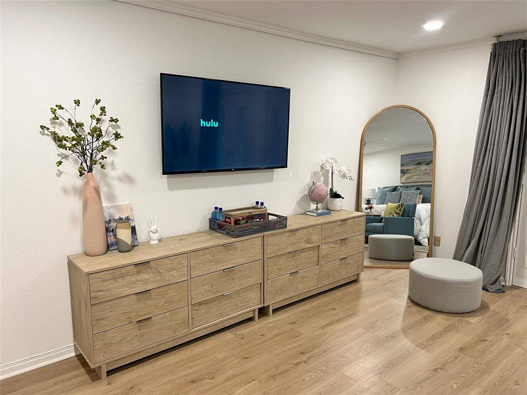 Same gorgeous hardwood floors throughout the home with the exception of the bathrooms, which are tiled.