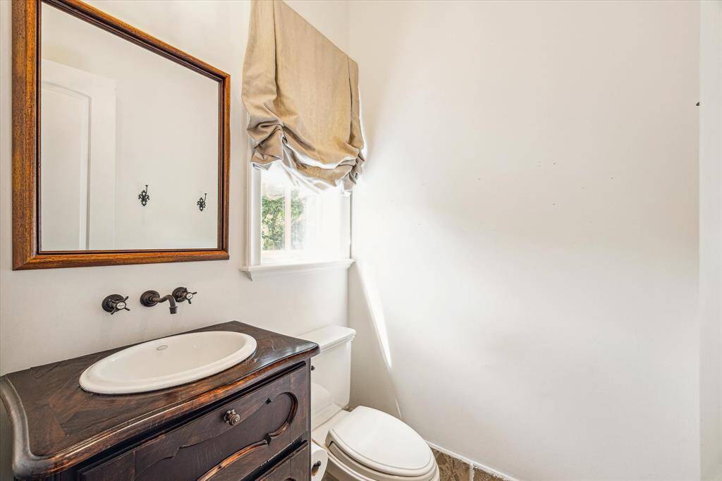 Here's the second handsome half bath located off the family room.