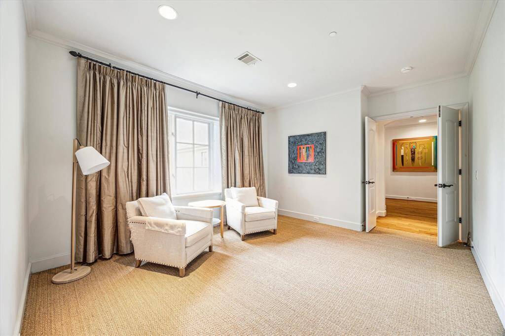 Charming sitting area in the luxurious primary suite.