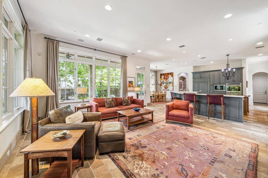Another view of the light and bright family room looking back to the kitchen and breakfast area.