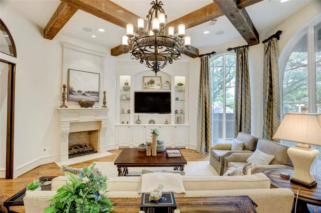 Cast stone fireplace in living room with beautiful mantelpiece design