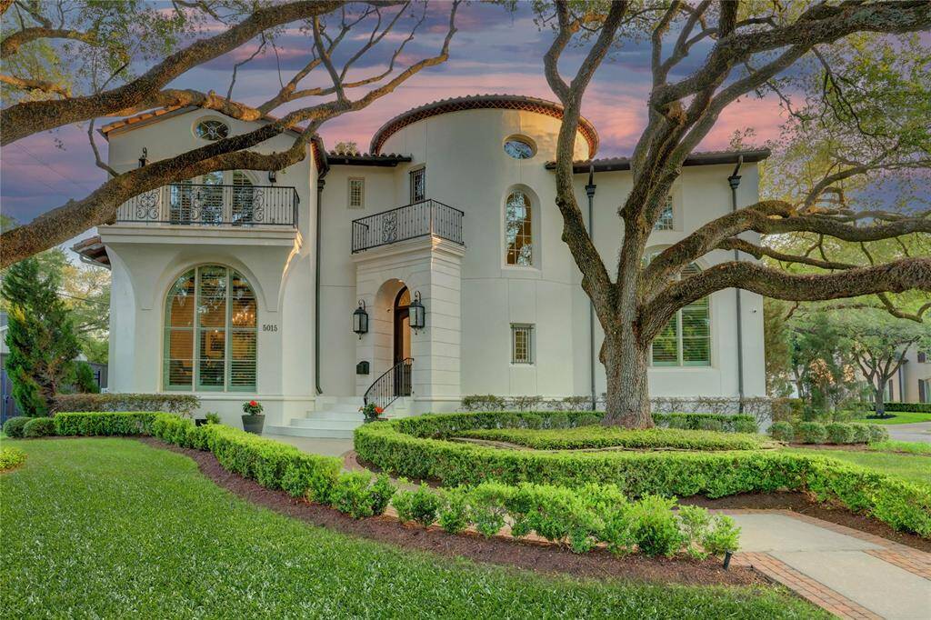 Style meets elegance, full stucco home with manicured green yard