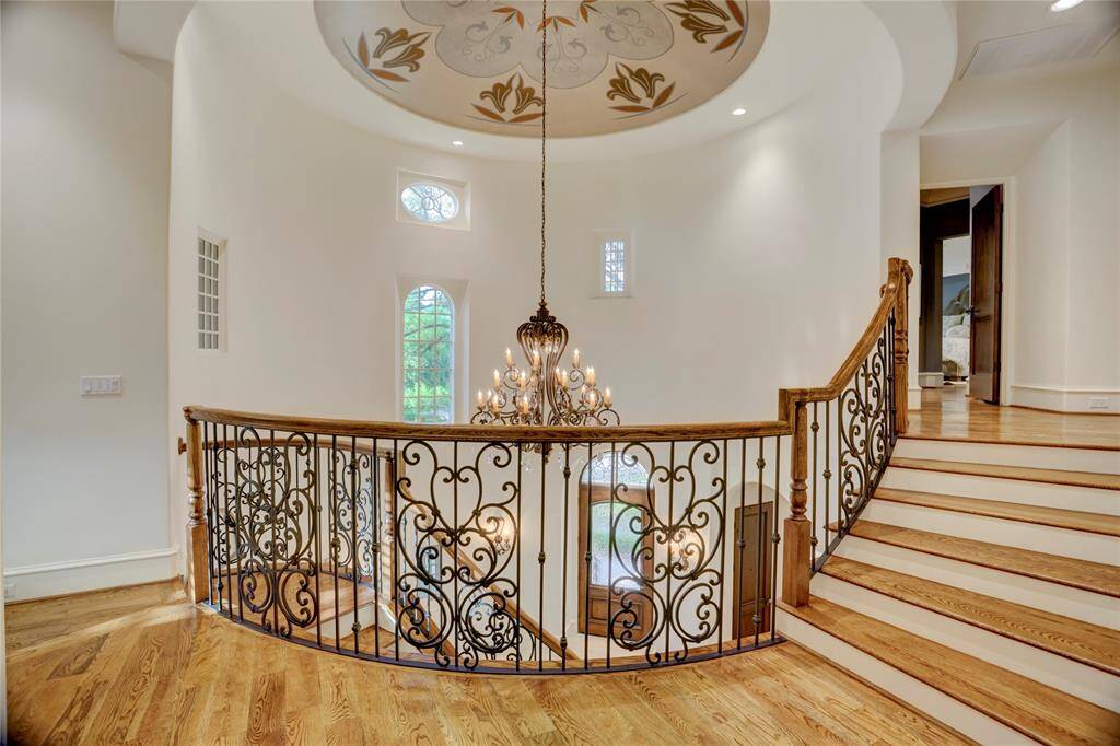 Classic Tuscan-style iron and crystal chandeliers