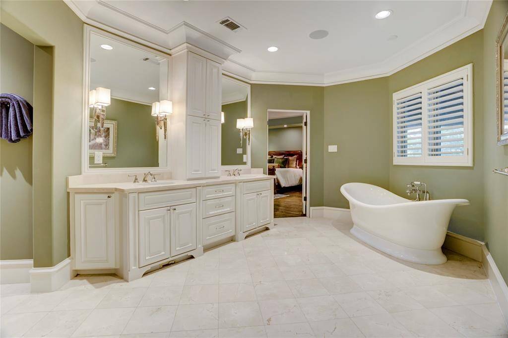 Rohl plumbing fixtures throughout, Victoria and Albert bathtub