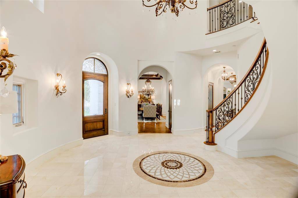 Groin vaulted hallway leading from entry rotunda to living/kitchen area