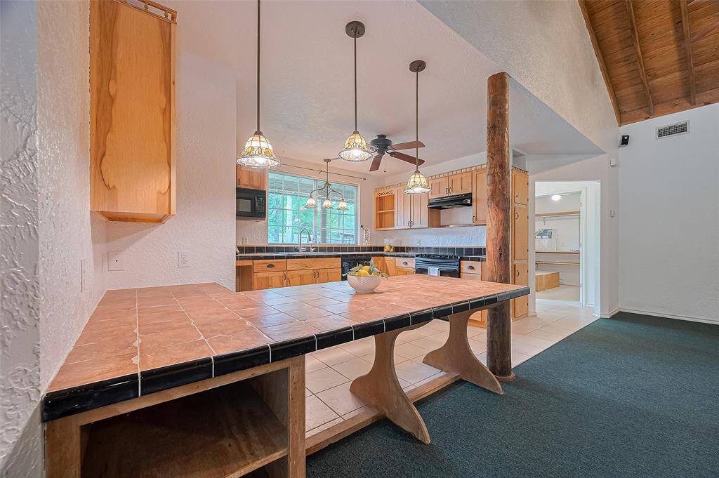 Step into the kitchen with a cozy, Tuscan-inspired ambiance that makes you feel right at home.