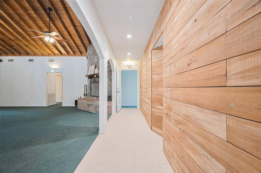 A key feature of this home is the inviting cedar-wall that connects to the bedrooms.