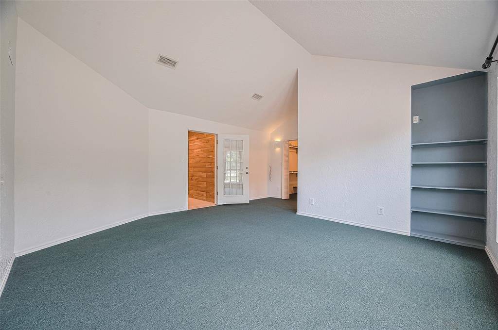 Another angle highlights the spaciousness of the primary bedroom.