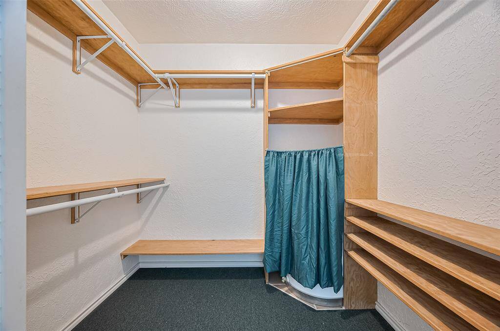 The primary suite boasts a large walk-in closet, with its own dedicated water heater for ultimate comfort and convenience.