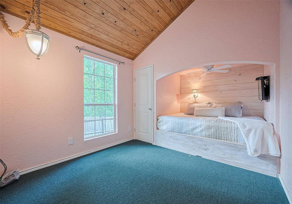 The cottage room is a peaceful haven for rest, offering flexible underbed storage or an extra pull-out bed.