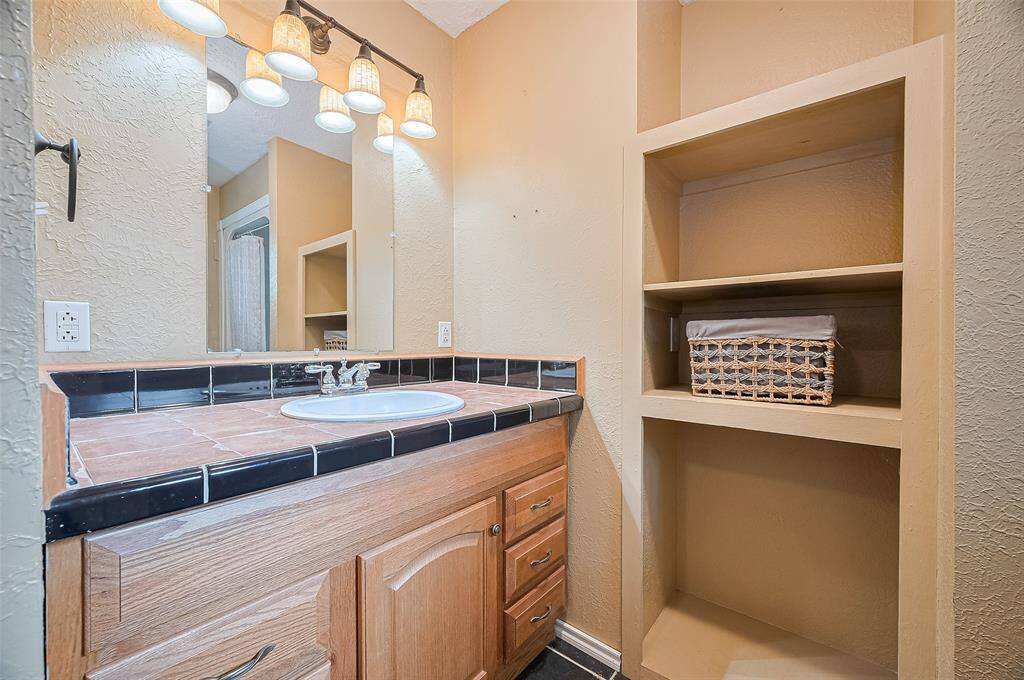 A well-placed secondary bathroom completes the home's floorplan.