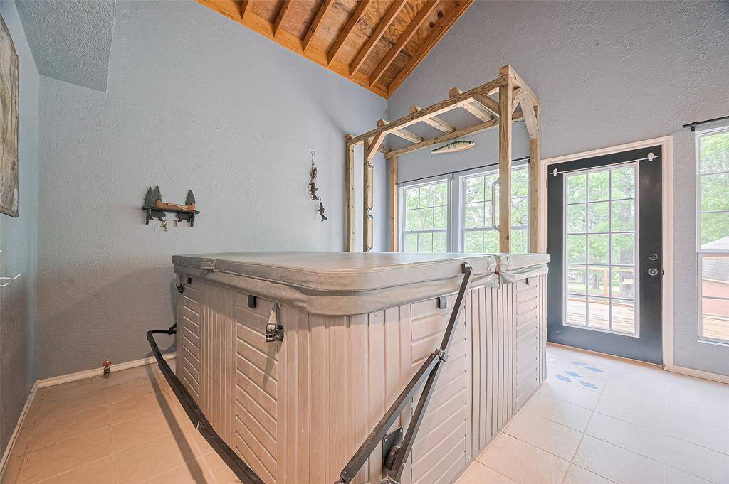 Tucked behind a secret cedar wall, a bonus game room awaits.