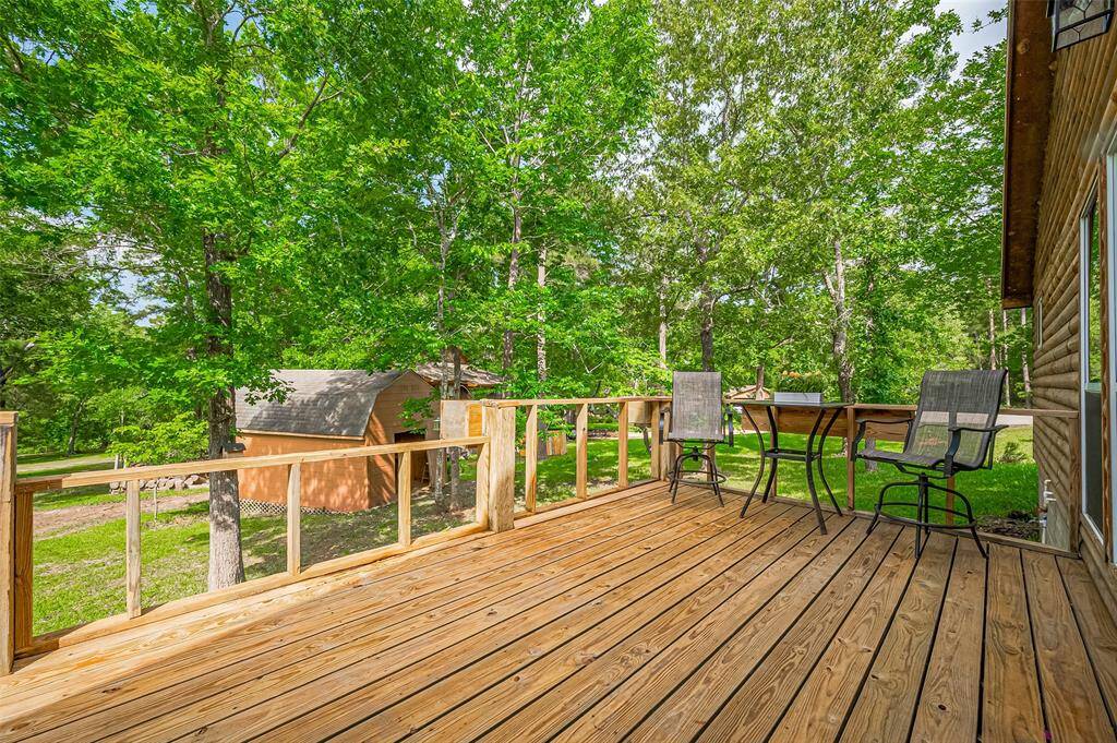 Spend peaceful time outdoors and enjoy nature's beauty from the back deck.