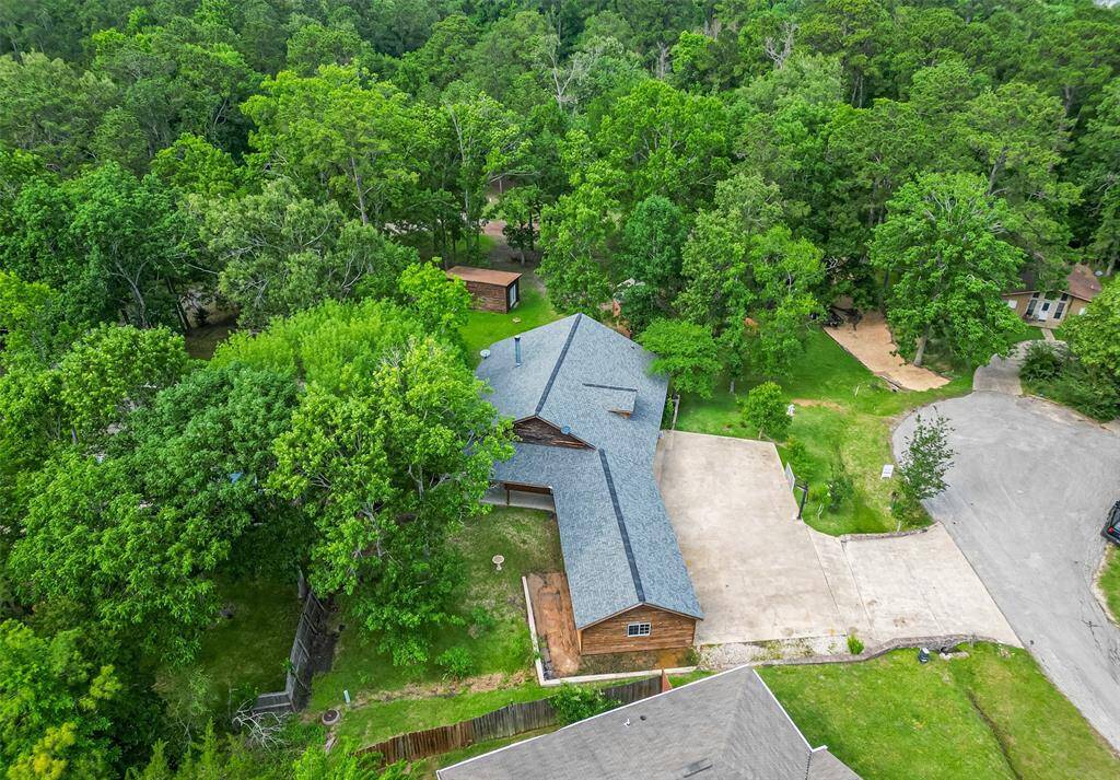 This home is beautifully situated among trees, ensuring a sense of peace and privacy.