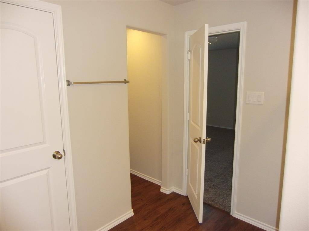 Entrance, garage and secondary bathroom