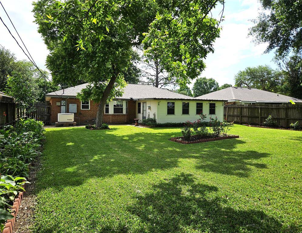 What a great backyard with shade and sunshine along with flowering landscape.