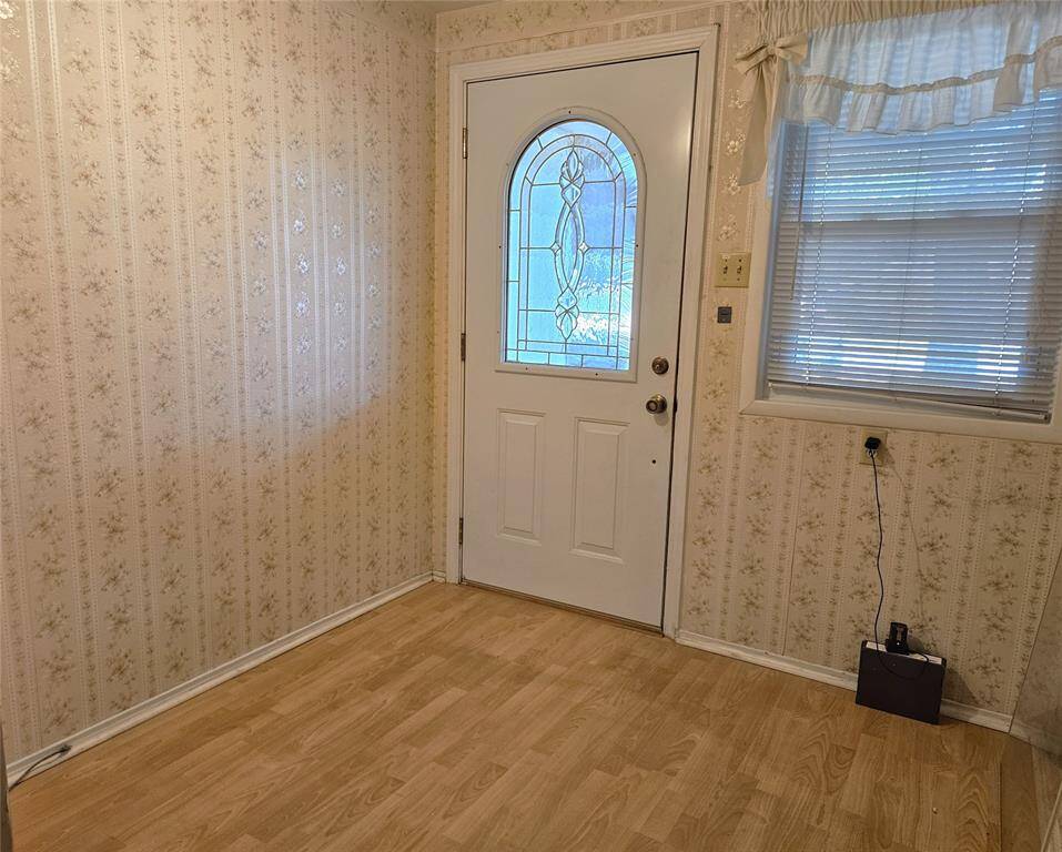 The front entry is spacious and has plenty of natural light.