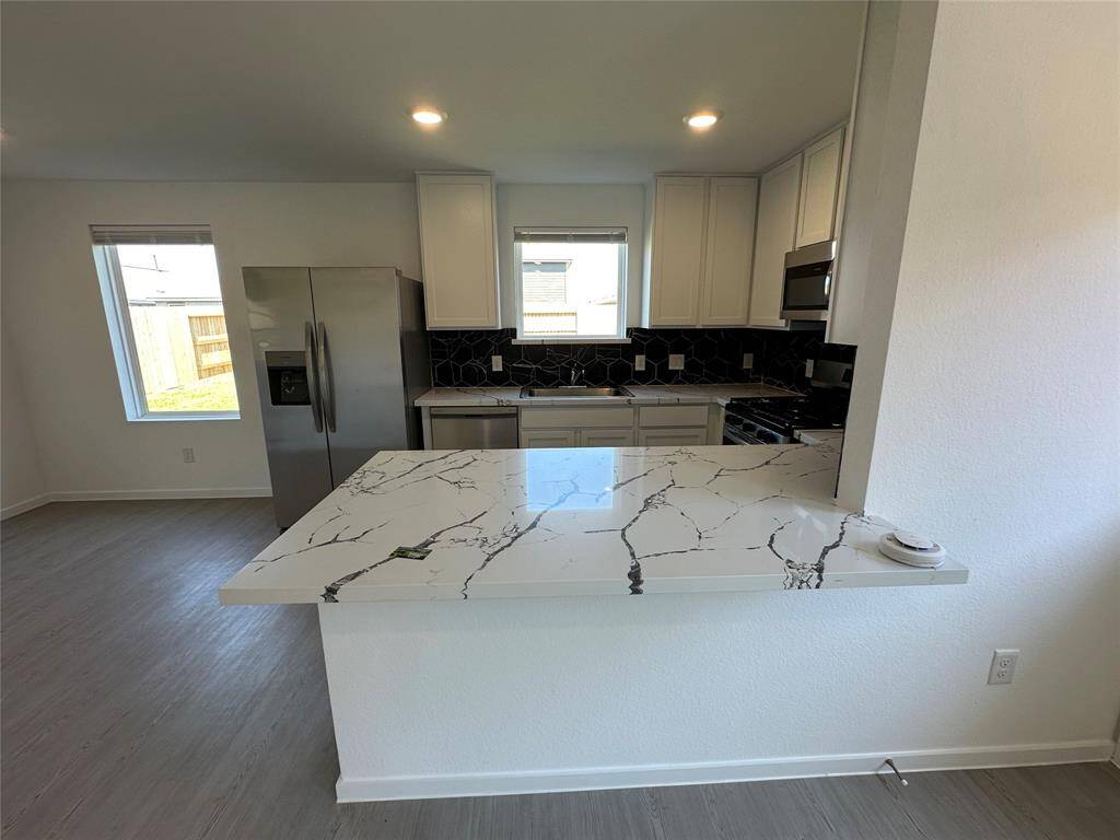 Beautiful countertop upgrages and backsplash