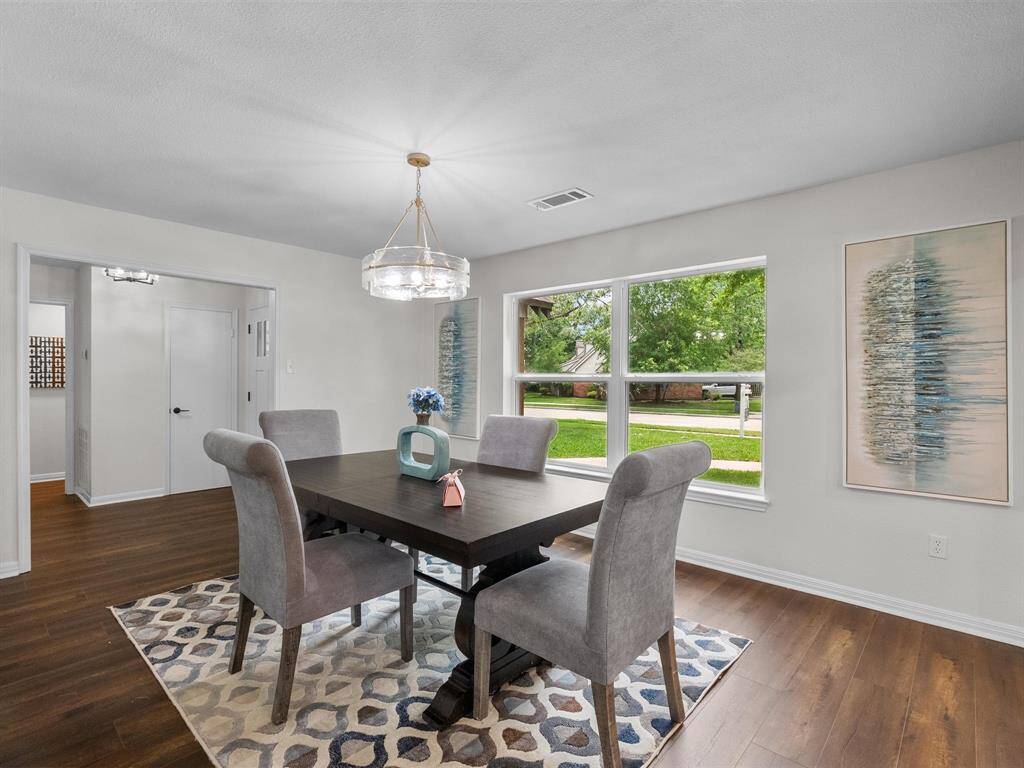 The dining room is bathed in great natural lighting.
