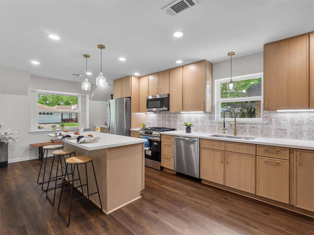 Sit at the new island and relax with a cup of hot coffee or a cold sweet tea--right in the heart of the home!