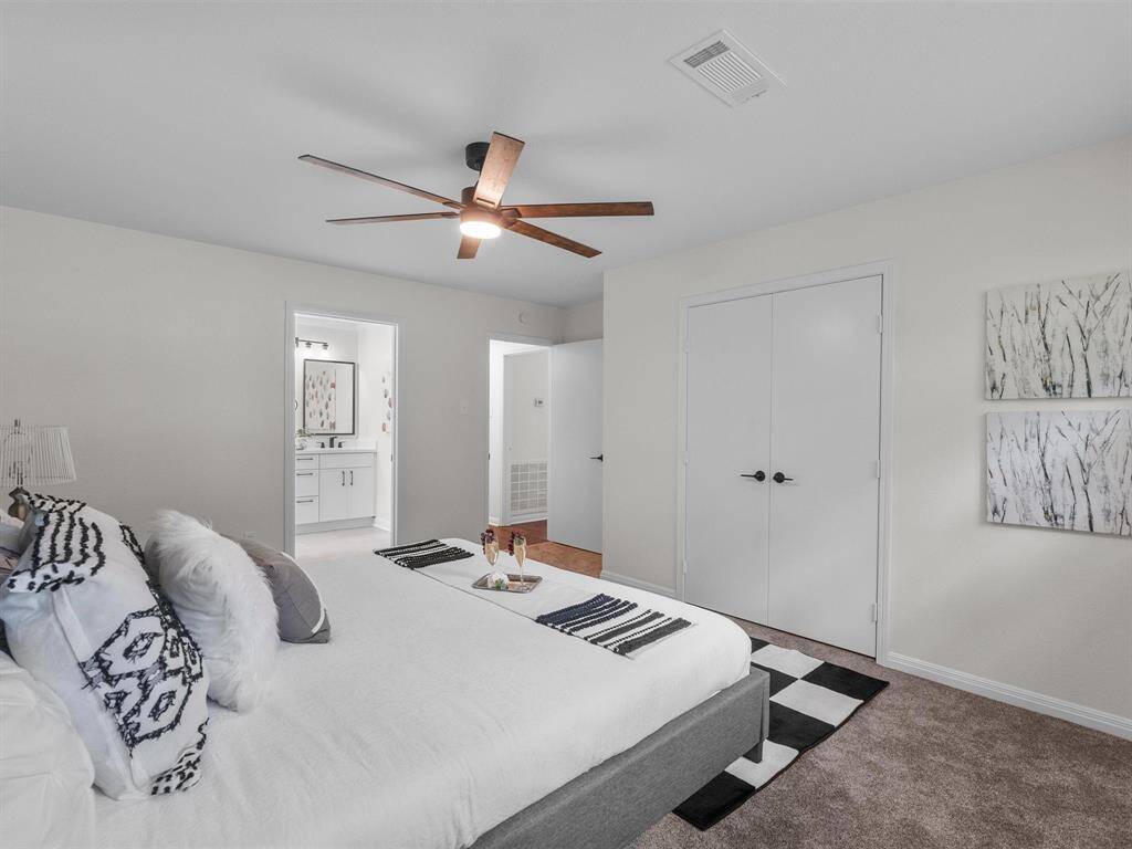 Relax and regroup in this peaceful and serene primary bedroom--on the first floor!