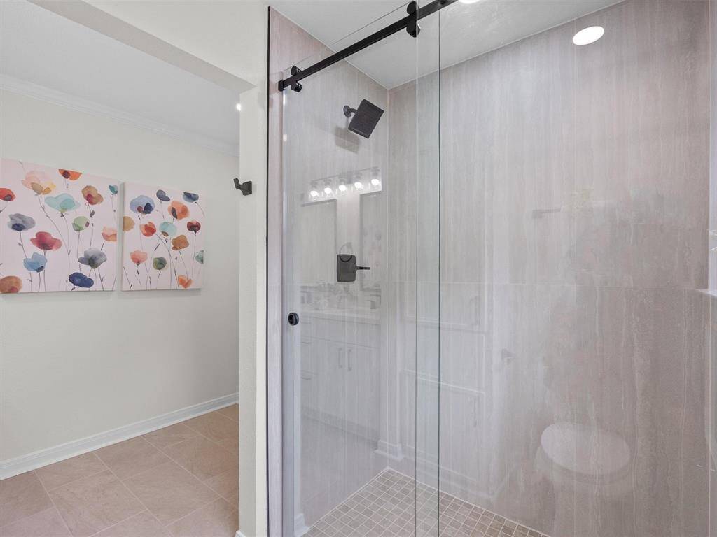 Wash away the stress of the day in this over-sized, walk-in shower in the primary bedroom ensuite.