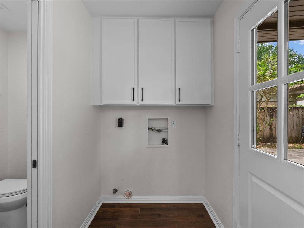 The in-house laundry area with washer and electric dryer connections.