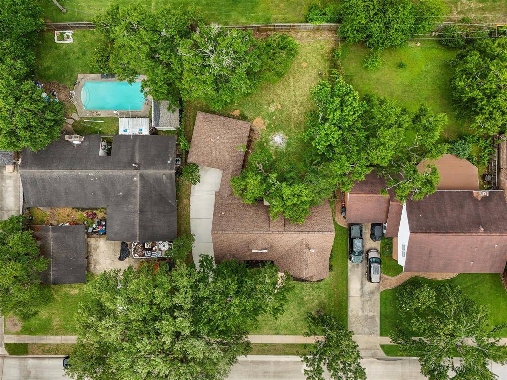 A view of this fantastic home with large lot and mature trees.