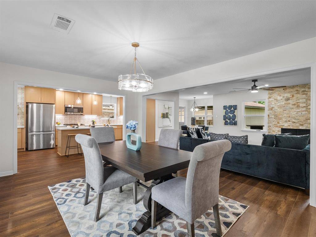 A generous dining area connects to the kitchen, perfect for family dinners or dinner parties with friends.