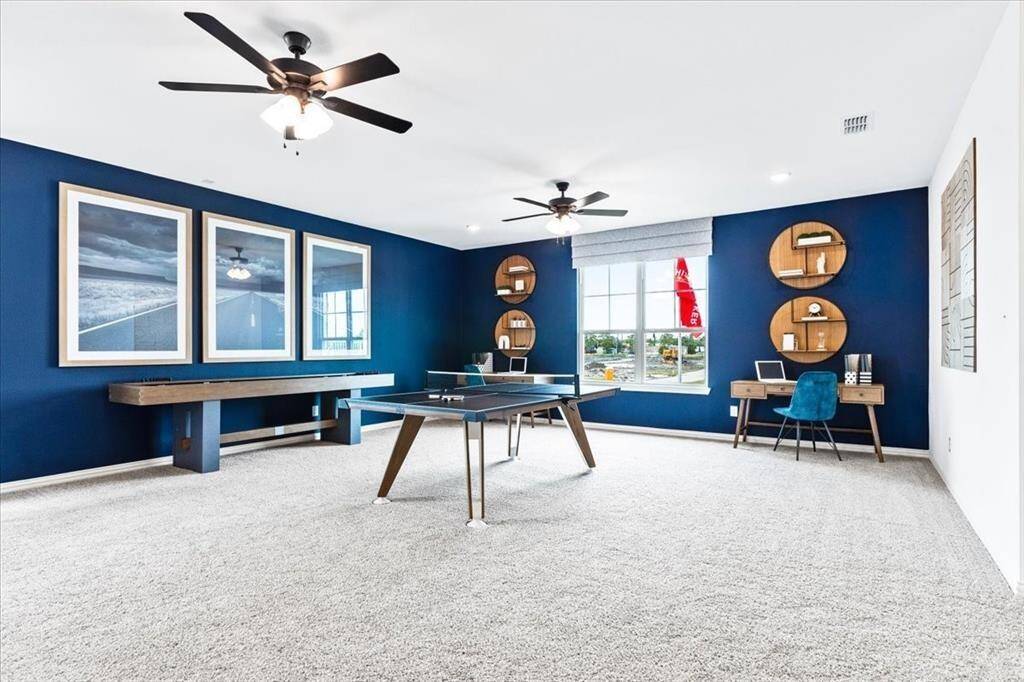 Representative photo of the Hawthorn II plan Game Room. Shown to highlight the flexible space—ideal for entertainment, play, or relaxing with the family.