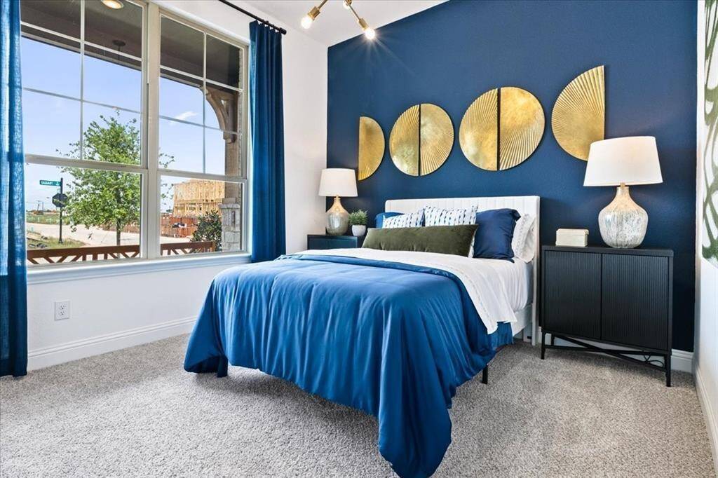 Representative photo of a Hawthorn II plan Secondary Bedroom. Shown to highlight the comfortable layout, closet space, and natural lighting.
