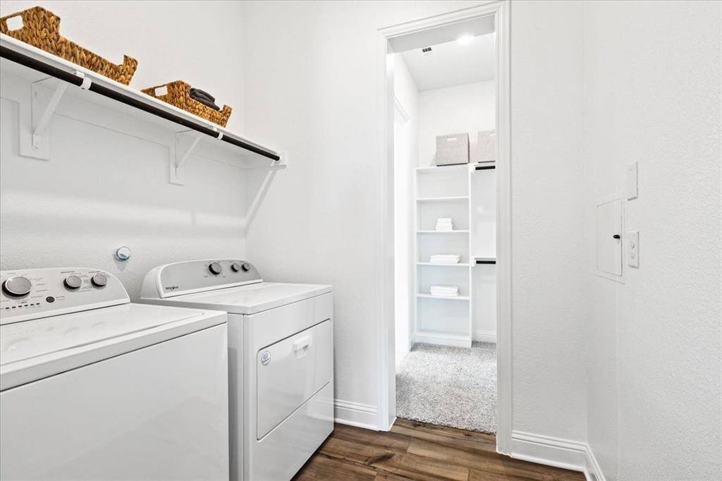 Representative photo of the Hawthorn II plan Utility Room. Shown to highlight the ample storage for all your laundry essentials, from detergents to fabric softeners, everything has its perfect place.