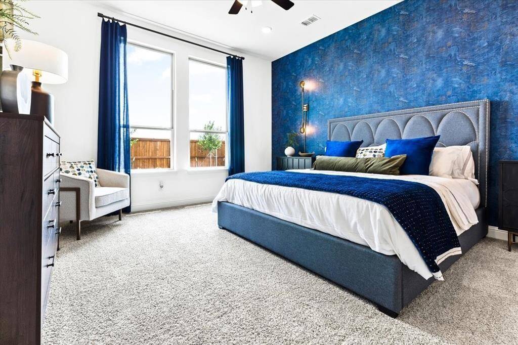 Representative photo of the Hawthorn II plan Primary Bedroom. Shown to highlight the generous space, natural light, and peaceful retreat feel.