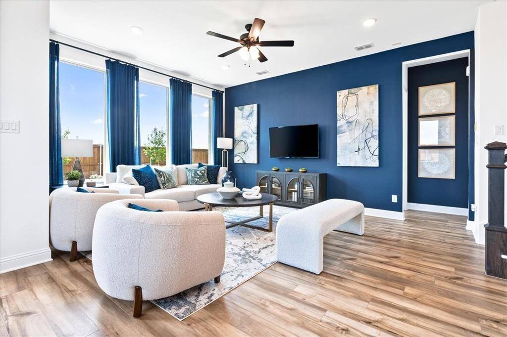 Representative photo of the Hawthorn II plan Living Room. Shown to highlight that this home feels as expansive as it is inviting, bathed in natural light.