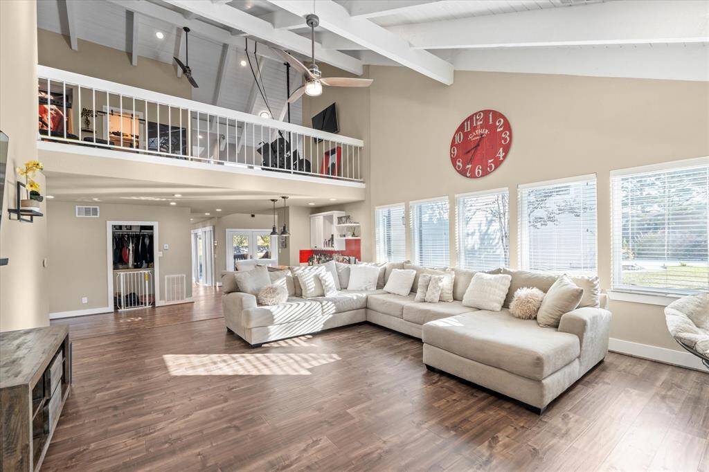 High vaulted ceilings looking up to the game-room.