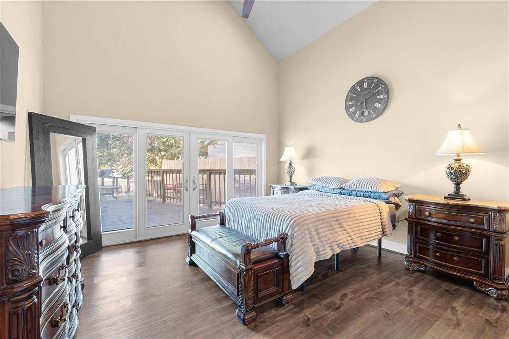 Primary bedroom with sliding doors out to your back oasis.