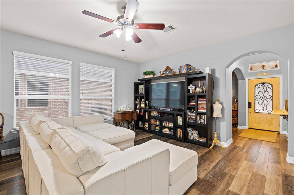Huge living room opens into the kitchen with access to the half bathroom. And yes an enormous "Lovesac" sectional will fit beautifully.