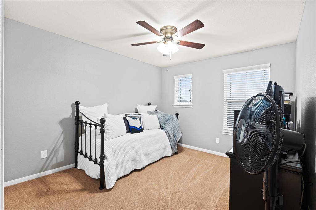 Secondary bedroom with good size closet.