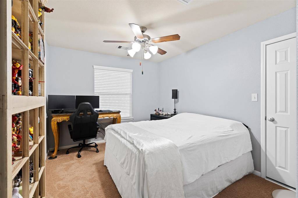 Fourth bedroom with a huge walk-in closet.