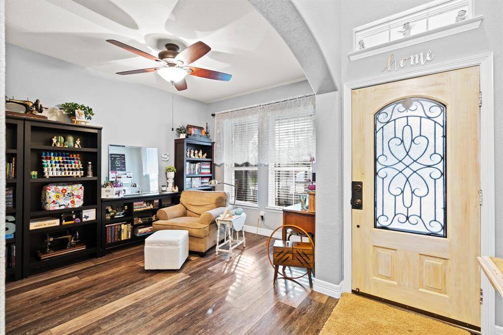 The study/living room has luxury vinyl flooring.