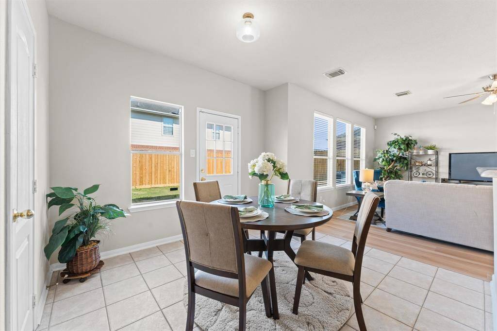 Start your mornings in a sunlit breakfast area that feels like a warm hug. Large windows fill the space with soft natural light, making it the perfect spot for coffee and quiet moments.
