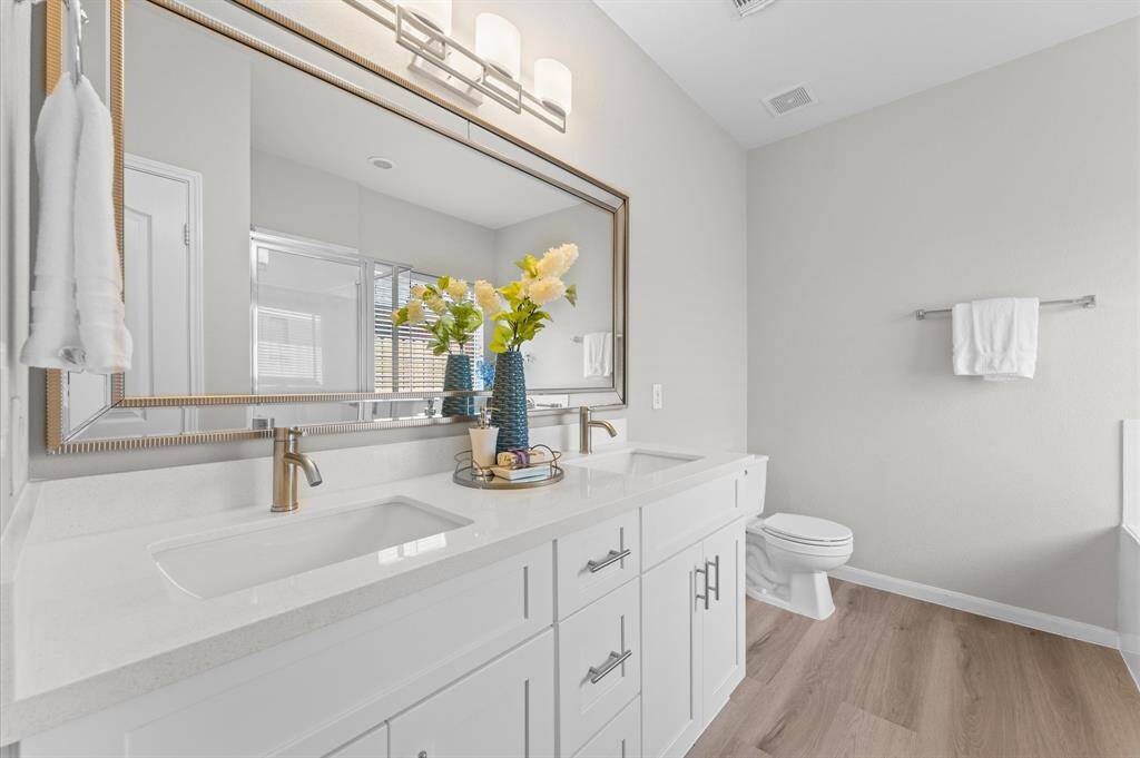 The ensuite bathroom feels like a private spa, offering a peaceful escape.