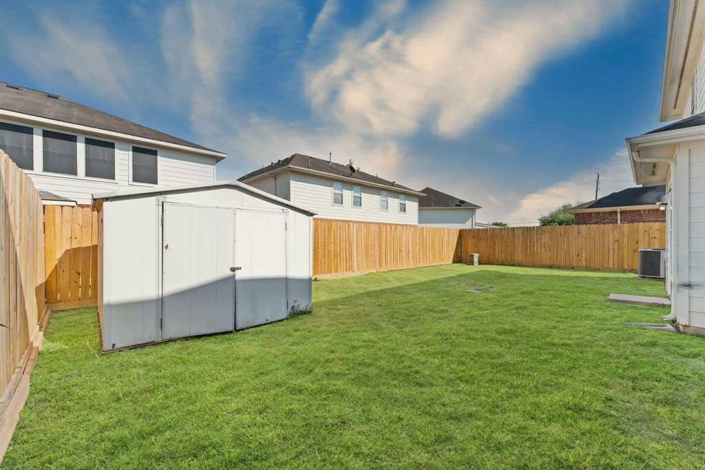 Step into your spacious backyard, where outdoor living is made effortless and enjoyable. In addition, you'll find a convenient storage room, perfect for keeping tools, outdoor equipment, and seasonal items organized.