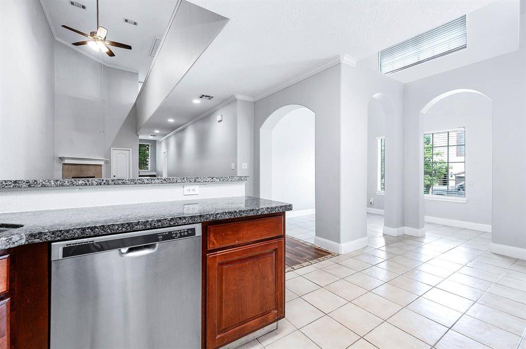 Kitchen viewing the open floor plan Living and Dining