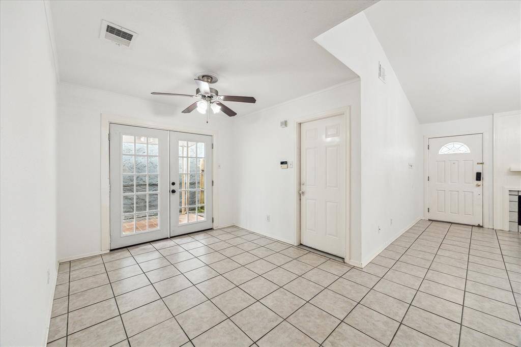 Formal dining with French doors