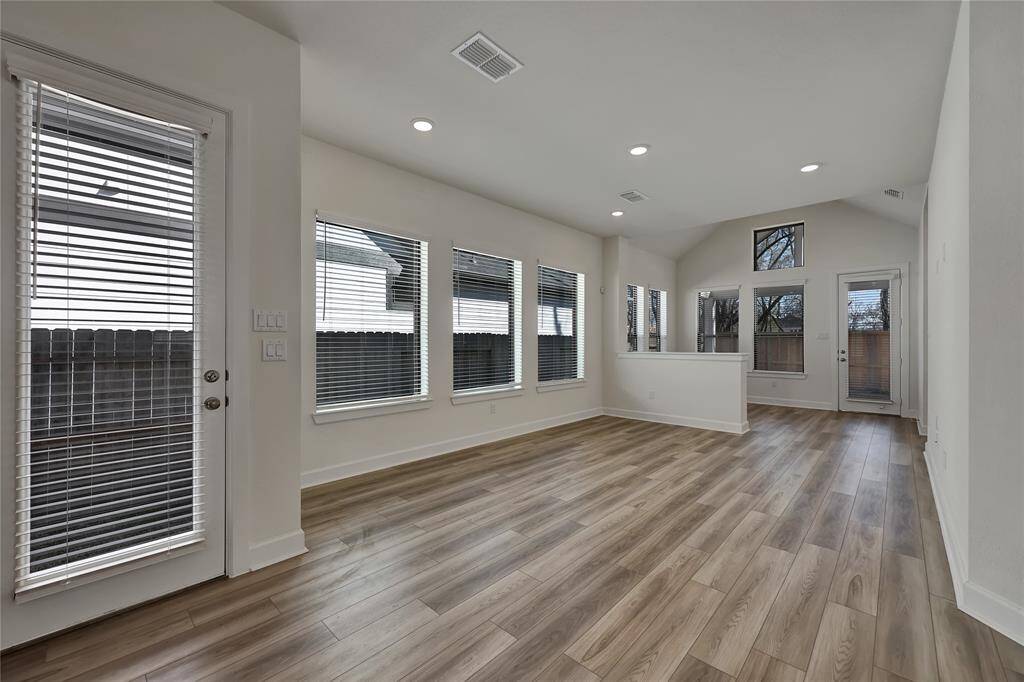 Living Roomaccompanied with high ceilings,and enormous amounts ofnatural lighting.