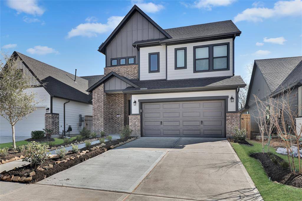 Fantastic Brick Elevation, lovelylandscaping, 2-Car Garage,extended driveway, anddedicated walkway.